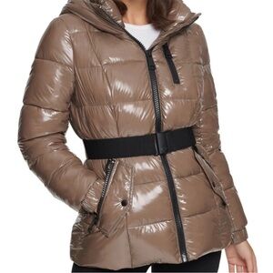 Sold! Calvin Klein women’s glossy/ shine puffer with belt hood. Like new. mocha
